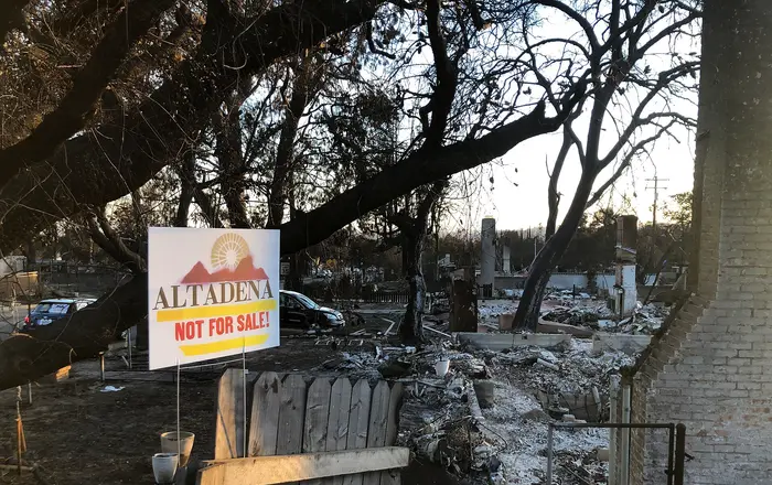 Altadena Not for Sale sign post Eaton Fire