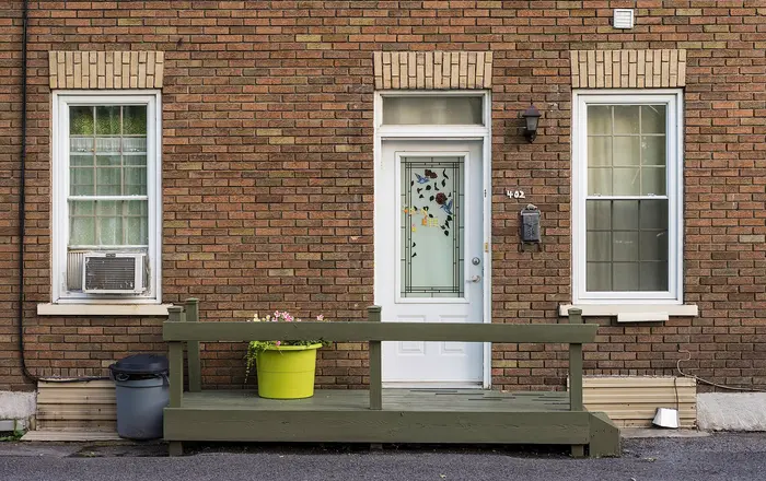 House front with a green porch, Vieux Limoilou